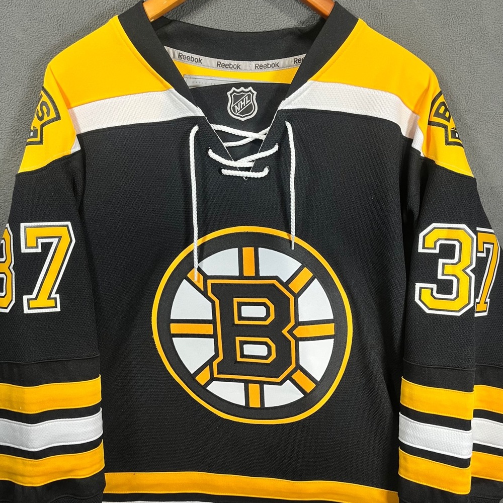 Reebok Boston Bruins Patrice Bergeron 37 NHL Jersey Mens Medium Black Yellow